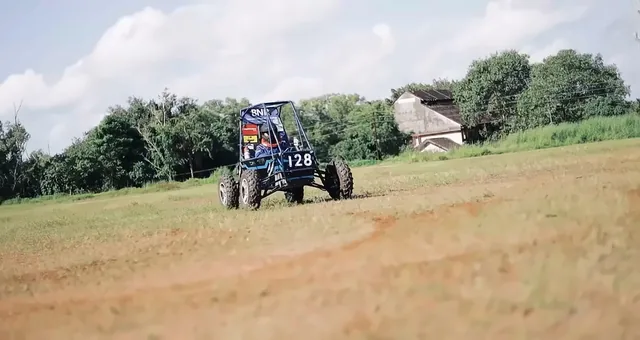 Baja ATV racing across the field