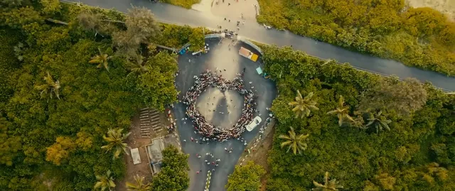 Aerial shot of students gathered in a formation on campus